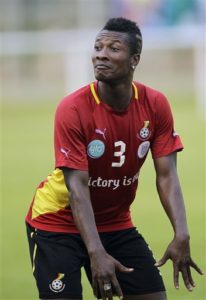 Ghana's soccer player Asamoah Gyan dances during their training in Ngouoni, 45km outside Franceville, Gabon, Friday Jan. 27, 2012. Ghana will play their African Cup of Nations Group D soccer match against Mali on Saturday Jan. 28, 2012. (AP Photo/Themba Hadebe)